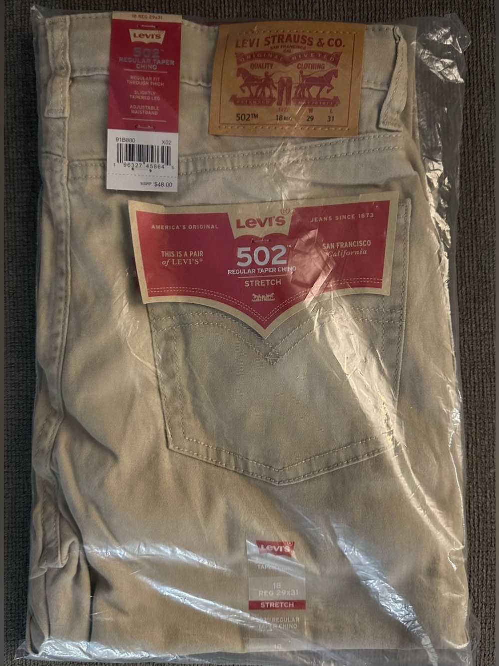 New in packaging Levi’s 502 reg taper chino boys 18 reg w29 L31 adjustable waist